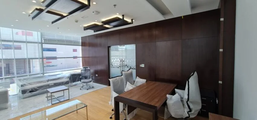 Office meeting space with timber feature wall and glass partitions